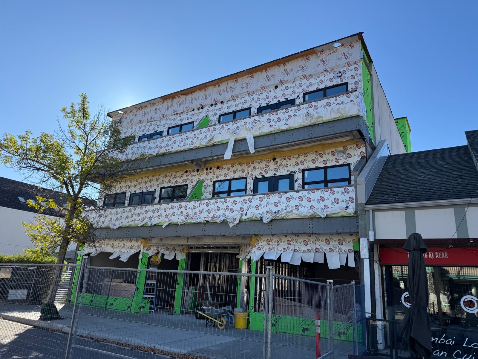 Front street view of building under construction